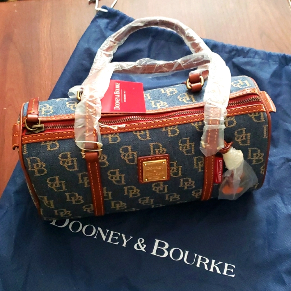 Vintage Dooney and Bourke Barrel Bag in dark denim and brown leather trim